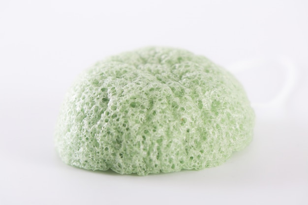 Facial cleansing sponge on a white background