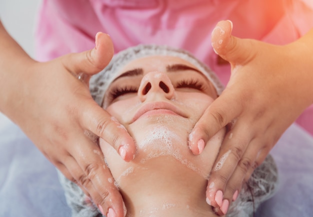 Facial cosmetic procedure in spa salon