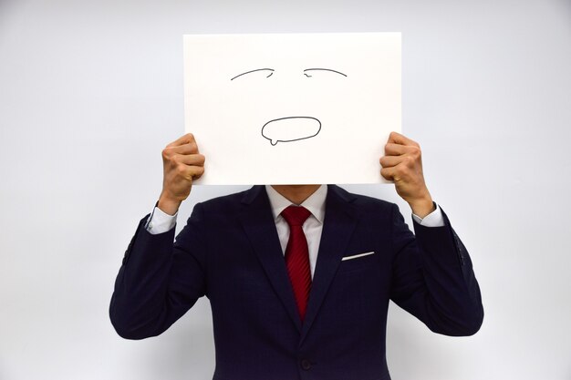 Photo facial expression of a person made of paper