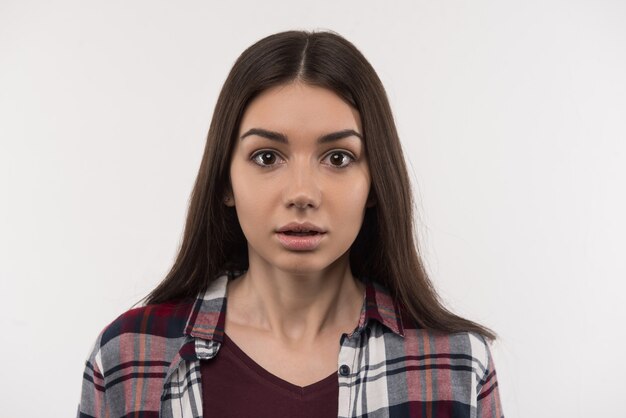 Facial expression. Portrait of a nice emotional woman being surprised