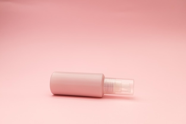 Facial gel on a gently pink background monochrome