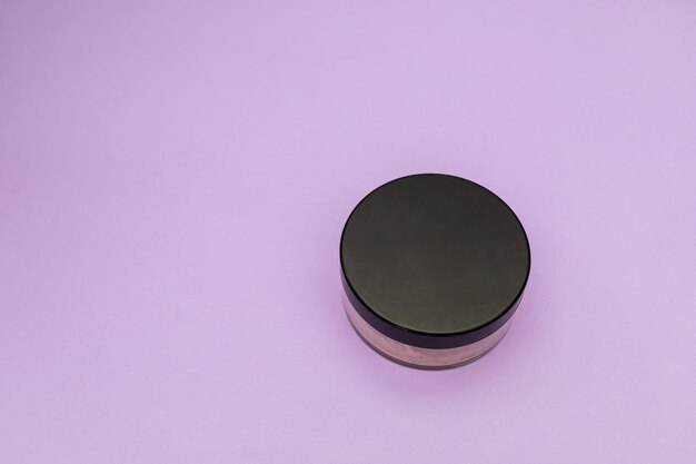 Facial Powder on Purple Background