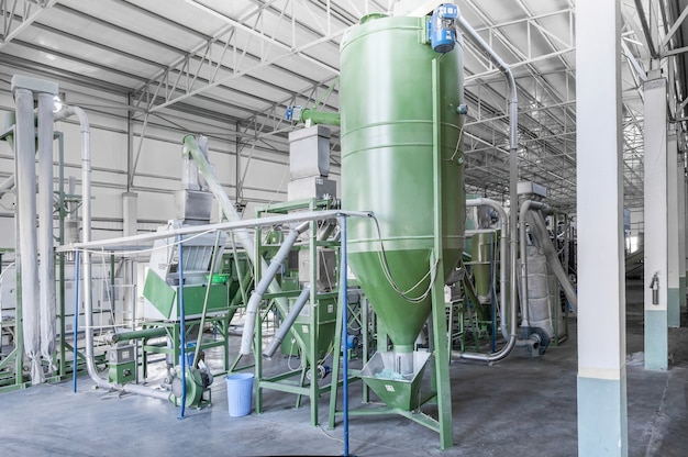 Factory equipment for processing and recycling of plastic bottles. PET recycling plant