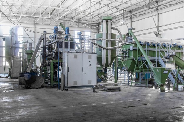 Factory equipment for processing and recycling of plastic\
bottles. pet recycling plant