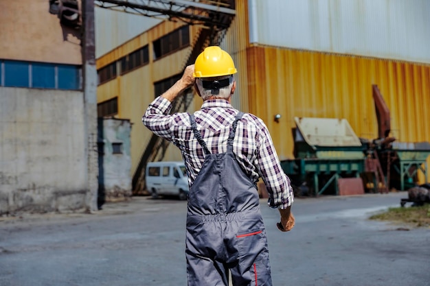 Factory worker going to his workplace