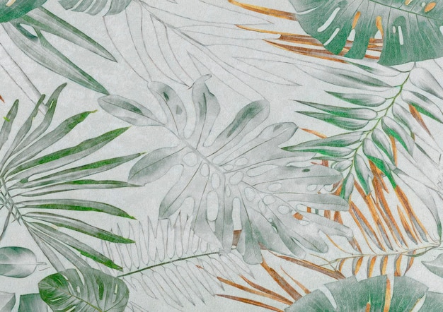 Faded tropical leaves are painted on white textured paper