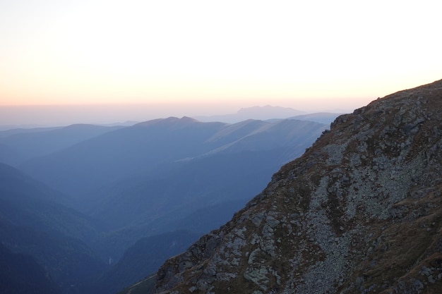 Fagaras mountains peaks landscape in sunset time, Romania.