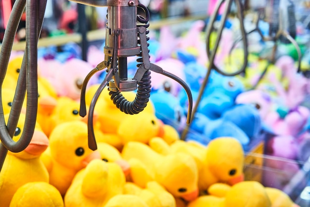 Fairground attraction catching stuffed toys