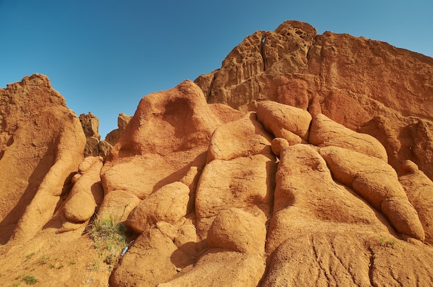 Fairy Tale Canyon, rock formations on the Issyk-Kul lake. Kyrgyzstan.Central Asia