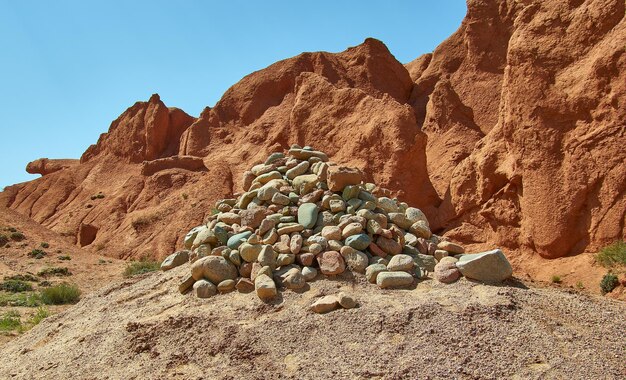 Fairy Tale Canyon rock formations on the IssykKul lake KyrgyzstanCentral Asia