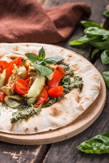 Fajitas with tortilla, basil and pesto