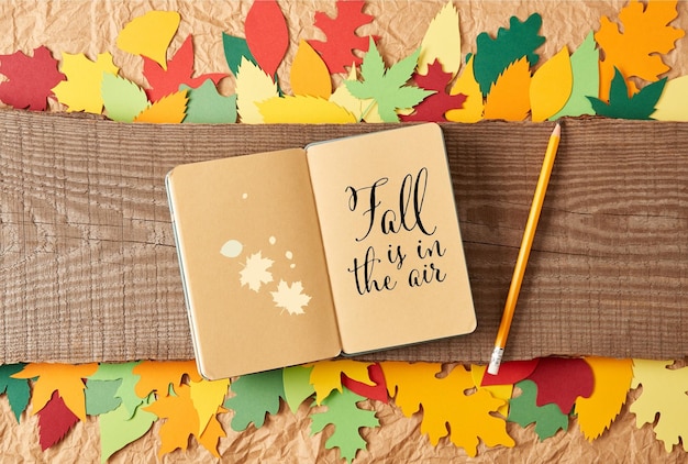 Photo fall in the air text art for autumn is coming.