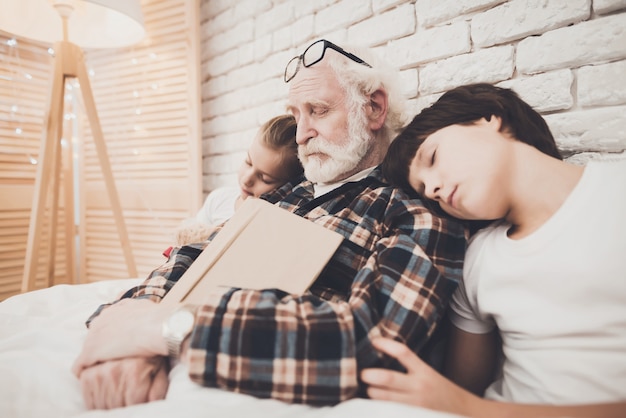 Fall Asleep after Bedtime Story Grandpa and Kids.