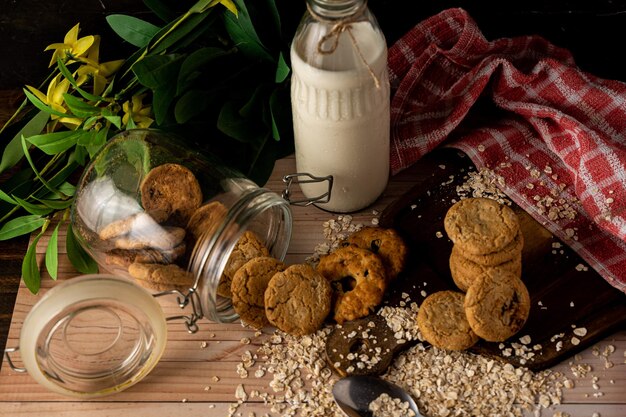 A Fallen Oatmeal Raisin Cookie Jar and a cookie tower on the side. General view.