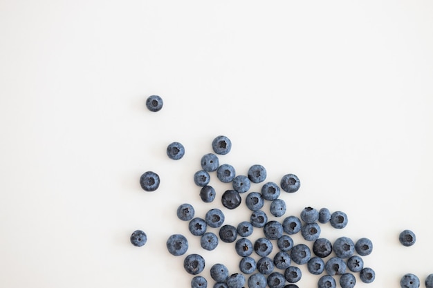 Falling blueberry isolated on white background