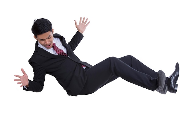 Falling businessman isolated on the white background