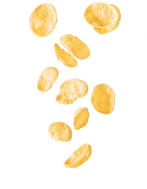 Falling corn flakes on white isolated