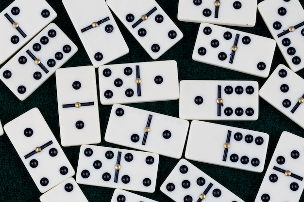 Falling dominoes. Domino effect. The domino game.