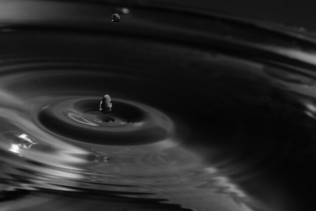 Falling drops in water