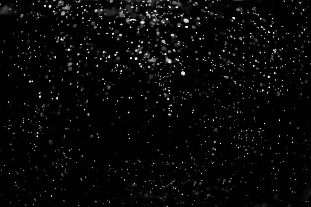 Falling Snow down On The Black Background