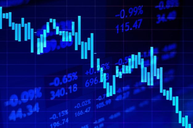 Falling stock market chart on dark background against the backdrop of stock quotes