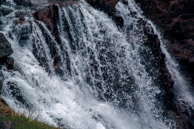 falling streams of water from the waterfall