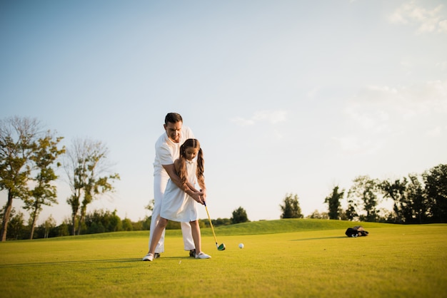 Familie is Golfen Sport Hobby Vader leert kind.