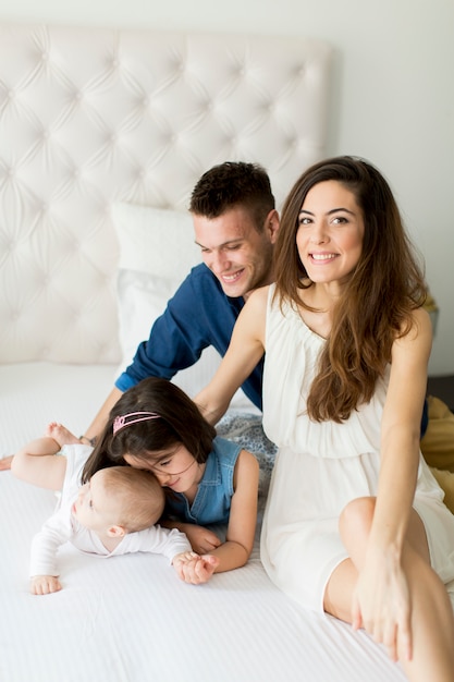 Family on the bed