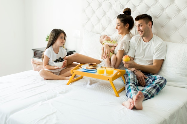 Family in the bed