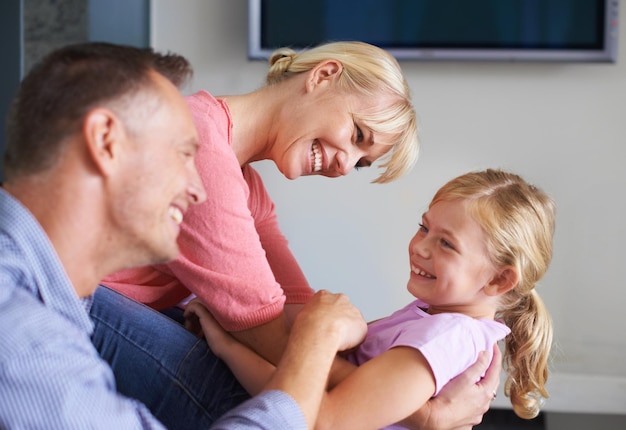 Family bonding Shot of a little girl and her father at home