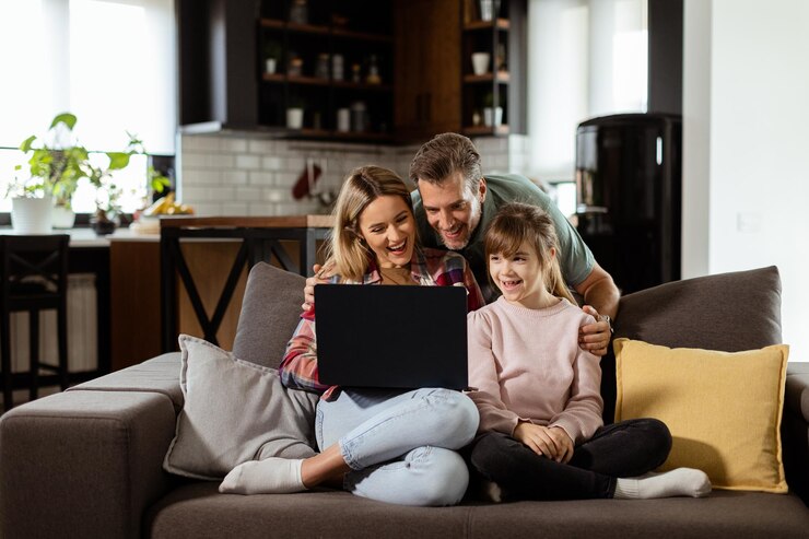 Photo family bonding time with laptop in cozy home setting