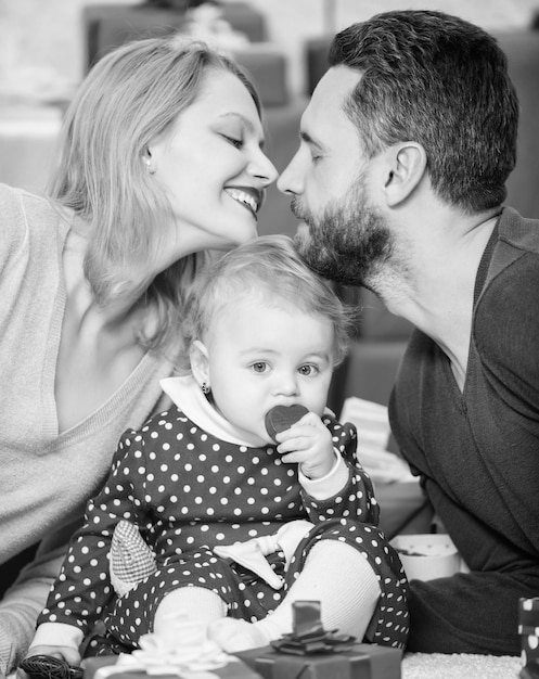 Family celebrate their love Romantic couple in love and baby girl Valentines day concept Together on valentines day Lovely family celebrating valentines day Happy be parents Perfect celebration