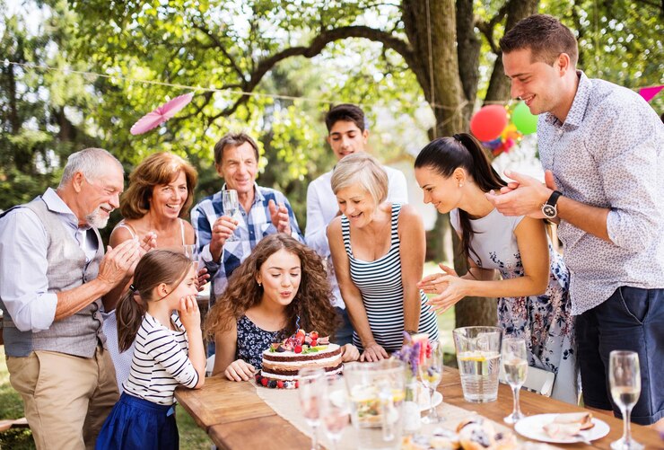 Photo family celebration or a garden party outside in the backyard