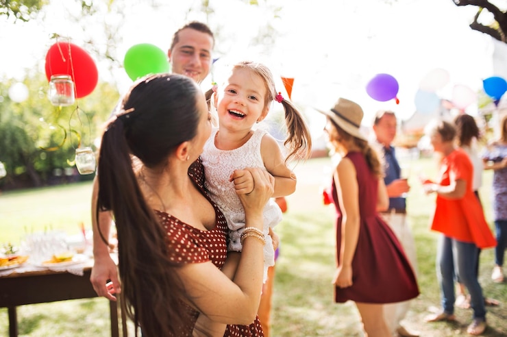 Photo family celebration or a garden party outside in the backyard