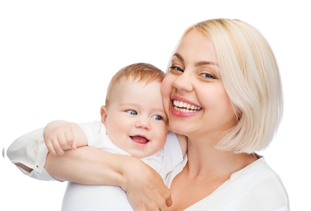 family, child and parenthood concept - happy mother with smiling baby