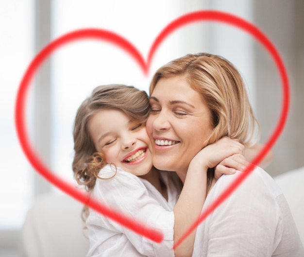 family, children and love concept - hugging mother and daughter