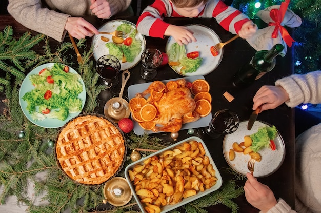 Family at christmas dinner, top view