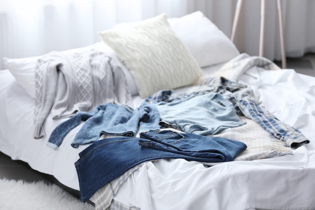 Family clothes on the bed