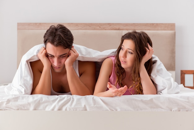 Family conflict with wife husband in bed