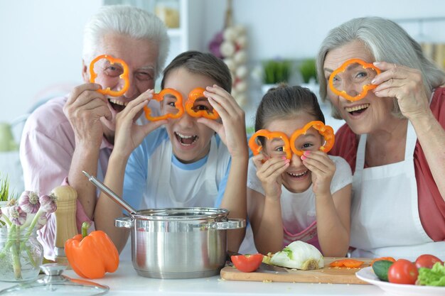 Family cooking together in kitchen