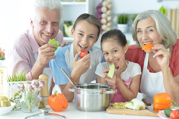 family cooking together in kitchen