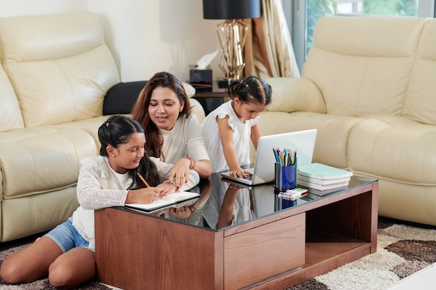 Family doing homework at home