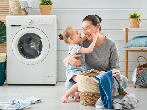 Photo family doing laundry