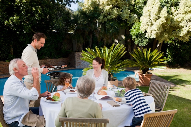 Family eating in the garden