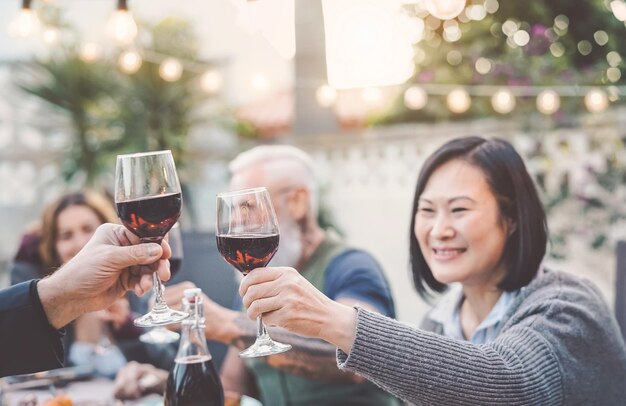 Family enjoying wine at party