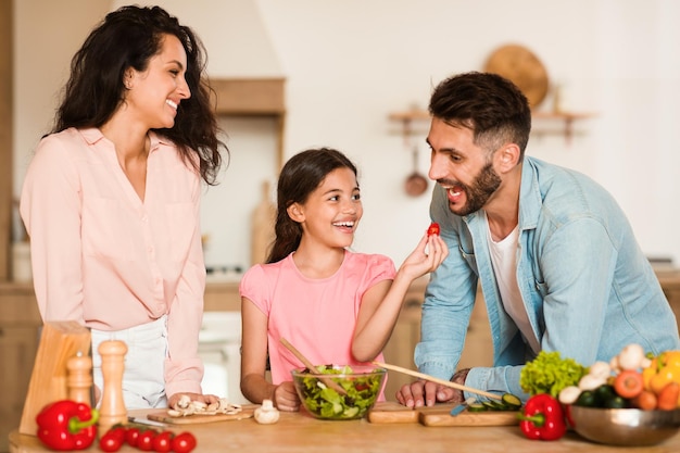 Family enjoys cooking time together