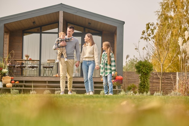 Family of four spending time in the countryside