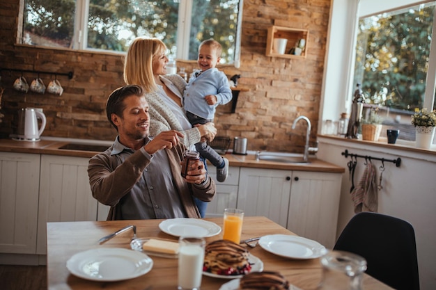 Family having breakfast at home