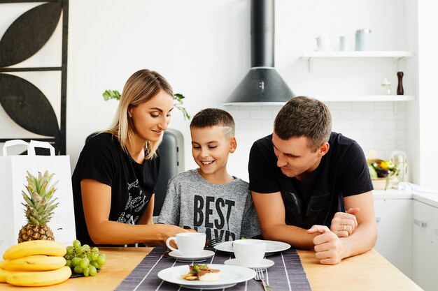 Family having breakfast in the kitchen