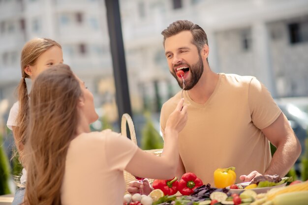 Family having dinner together outdoors